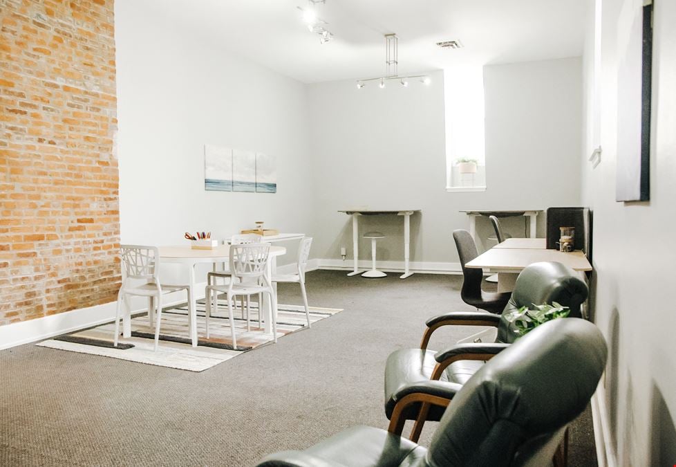 Team office, with exposed brick