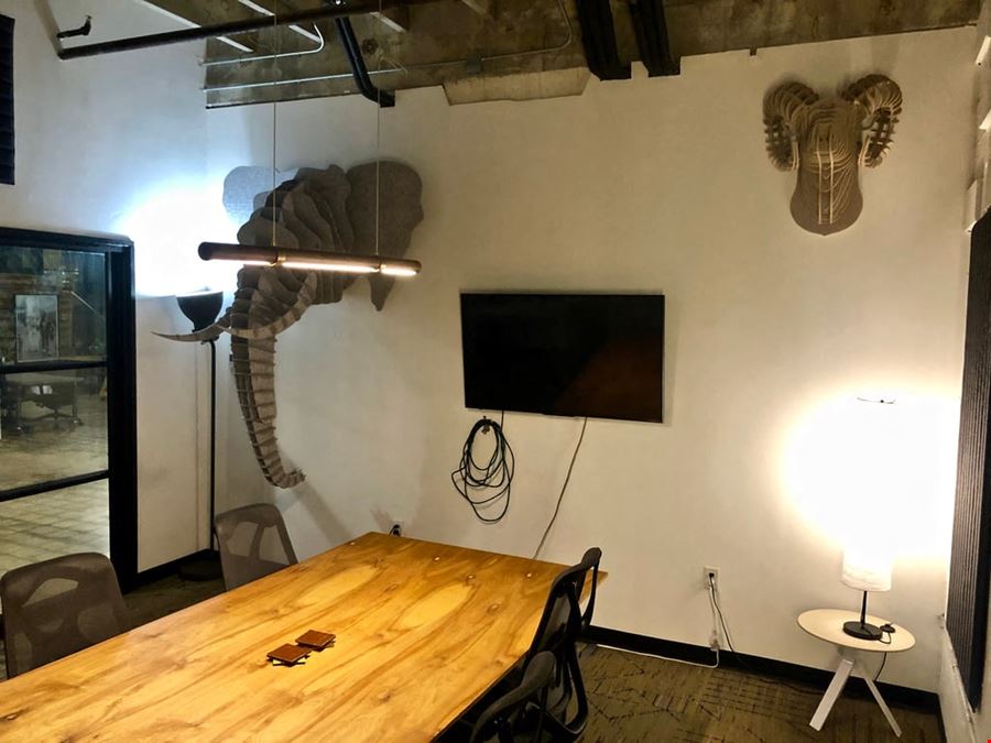 Avocado Room: 8-Person Meeting & Conference Room in Industrial Coworking Space