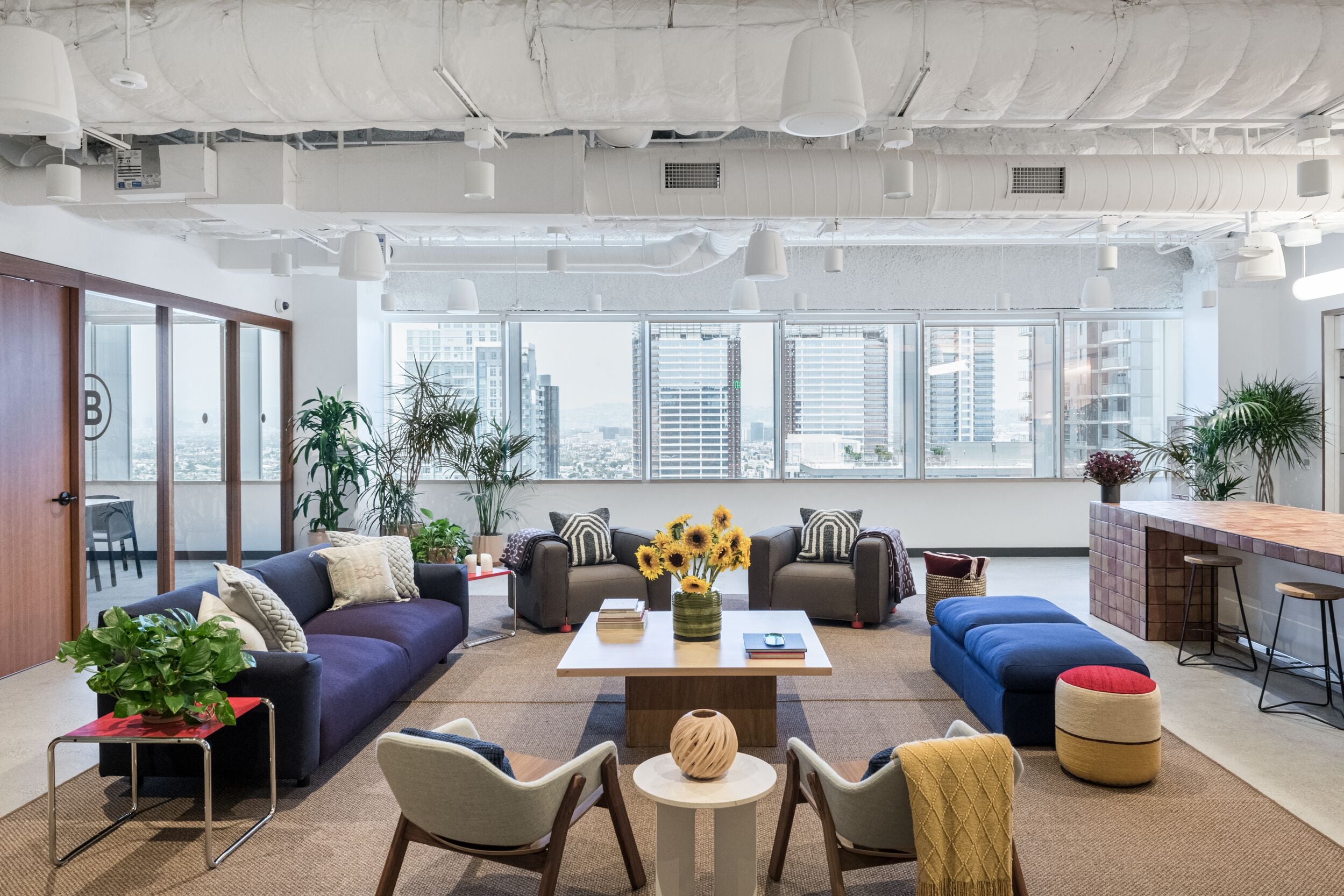 Shared workspaces at WeWork - 1150 S Olive St | CoworkingCafe