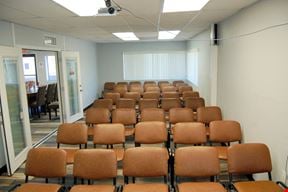 Event Venue with Podium, Projector & Sound, Room #201 – Up to 50 Guests