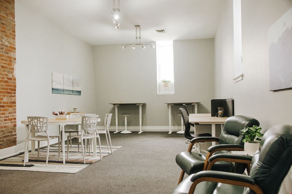 Team office, with exposed brick